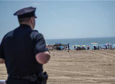 An officer in the Quality of Life division patrols Coney Island.